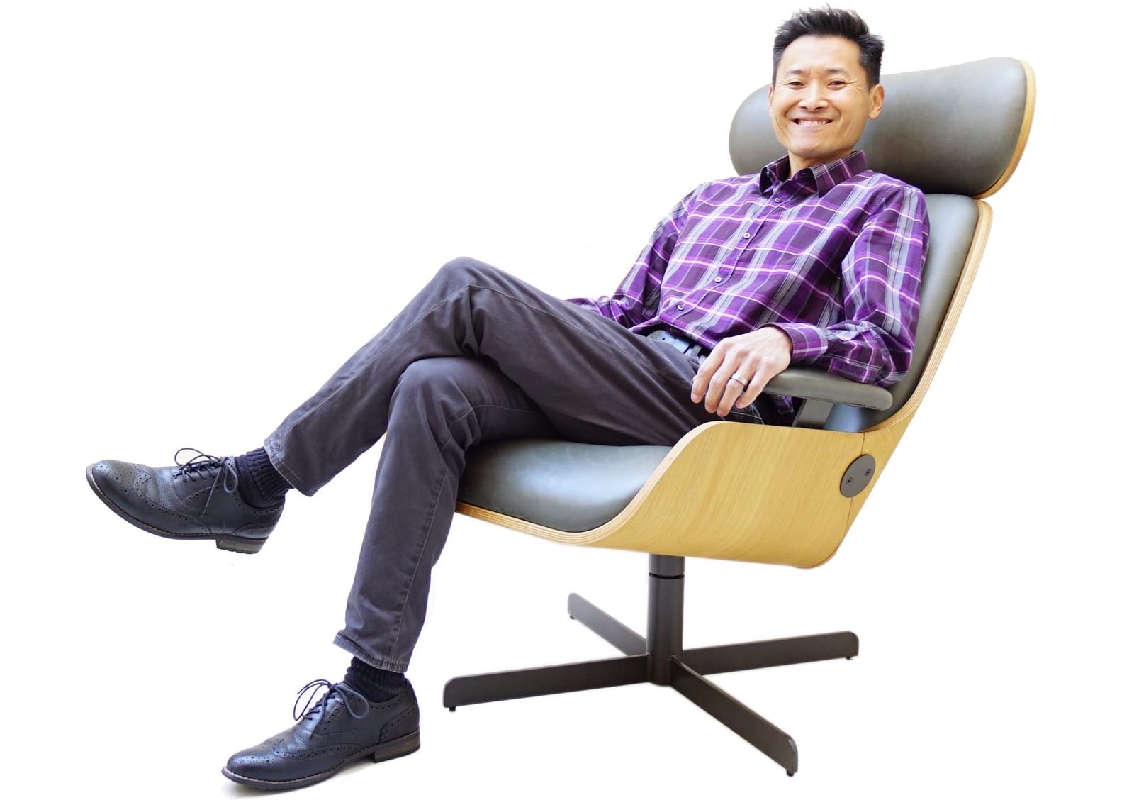 Dave Kang sitting in a chair